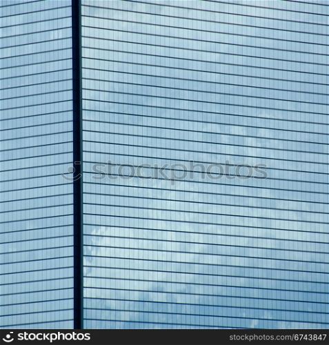 Skyscraper background pattern. Closeup of a skyscraper glass facade background pattern