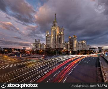 Skyscraper on Kotelnicheskaya Embankment and Traffic Trails at Dusk, Moscow, Russia