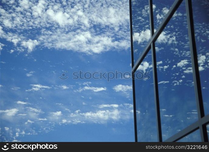 Skyscraper Windows Reflecting Clouds