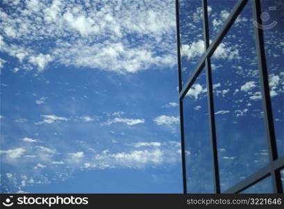 Skyscraper Windows Reflecting Clouds