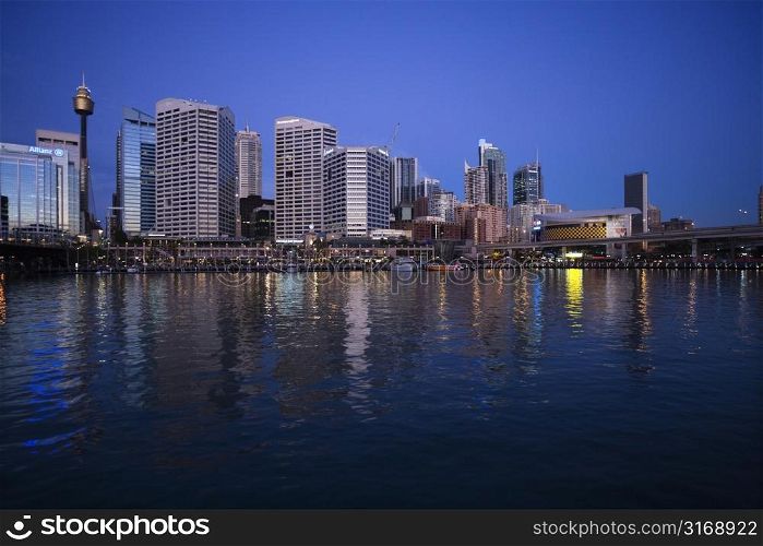 Skyscrapers and Darling Harbour at dusk in Sydney, Australia.