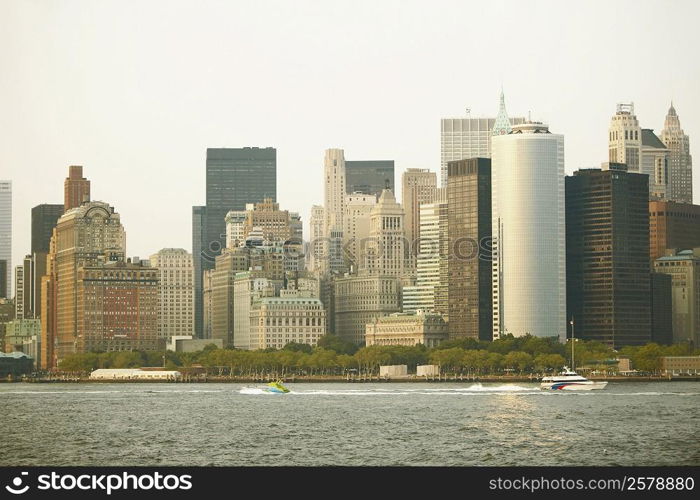 Skyscrapers at the waterfront in a city, New York City, New York State, USA