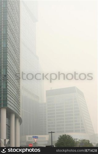 Skyscrapers in Moscow City district is seen through the heavy smog from wildfires