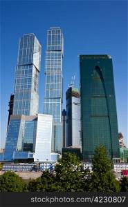 Skyscrapers of Moscow city under blue sky with clouds