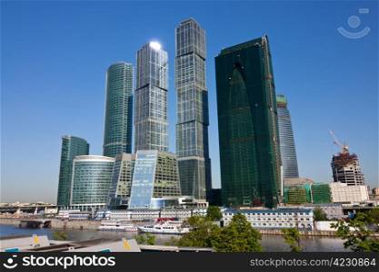 Skyscrapers of Moscow city under blue sky with clouds