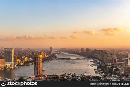 Skyscrapers on river Nile in Cairo at sunset, Egypt. Skyscrapers on Nile