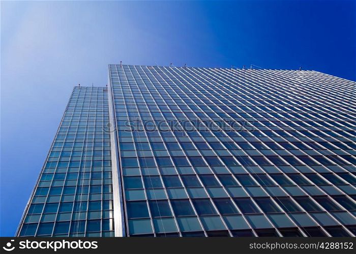 Skyscrapers view with blue sky . office buildings. modern glass silhouettes of skyscrapers