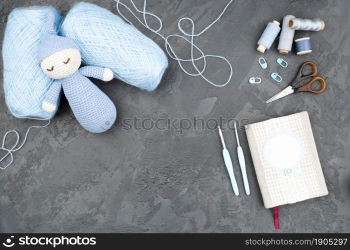 slate background with blue wool. Beautiful photo. slate background with blue wool