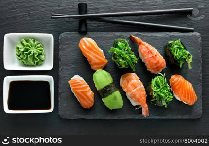 Slate plate with sushi set and wasabi