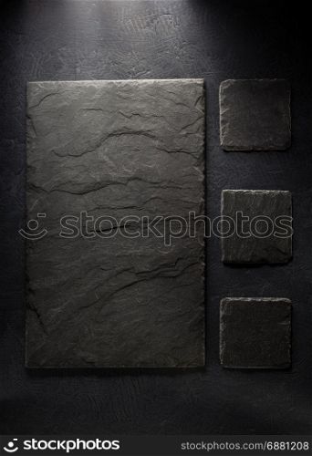 slate signboard at black background texture
