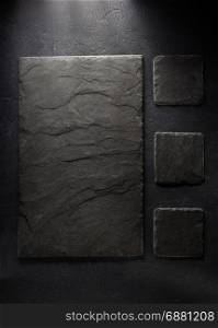 slate signboard at black background texture
