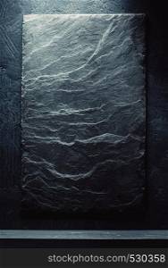 slate stone and shelf on black background