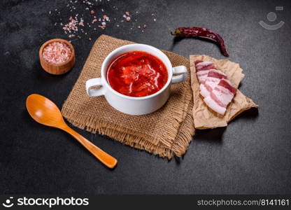 Slavic soup, Borsch, beet broth with vegetables and meat, Ukrainian soup. Borscht - traditional Ukraine soup made of beetroot, tomato, cabbage, carrot and beef