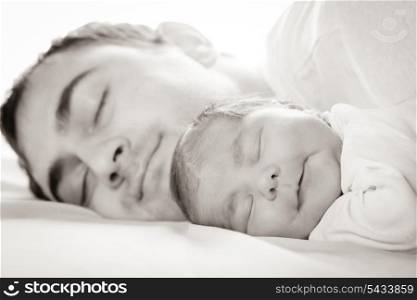 Sleep baby with dad, closeup faces