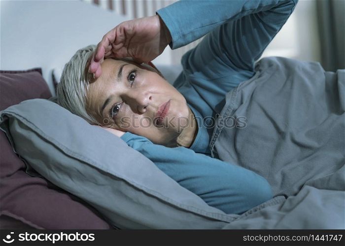 Sleep Disorder. Worried Senior Woman Suffering from Insomnia, Having Headache, Touching her Forehead