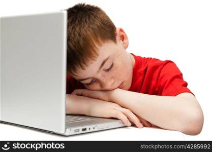 sleeping boy with a laptop on a white background