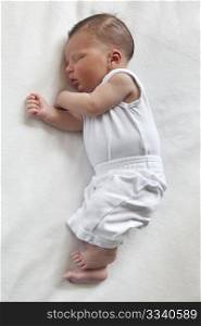 Sleeping newborn baby full lenght