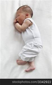 Sleeping newborn baby full lenght