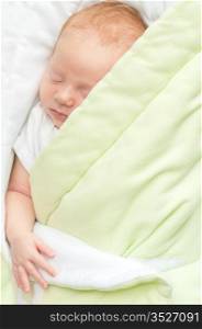 Sleeping Newborn Baby Under Green Blanket