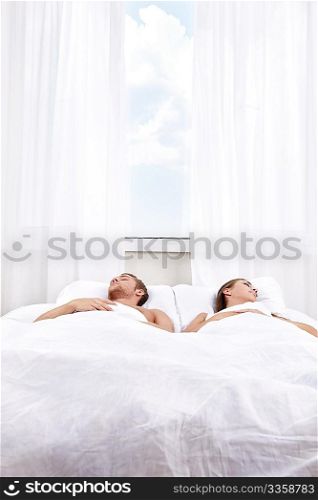 Sleeping young people in the bedroom