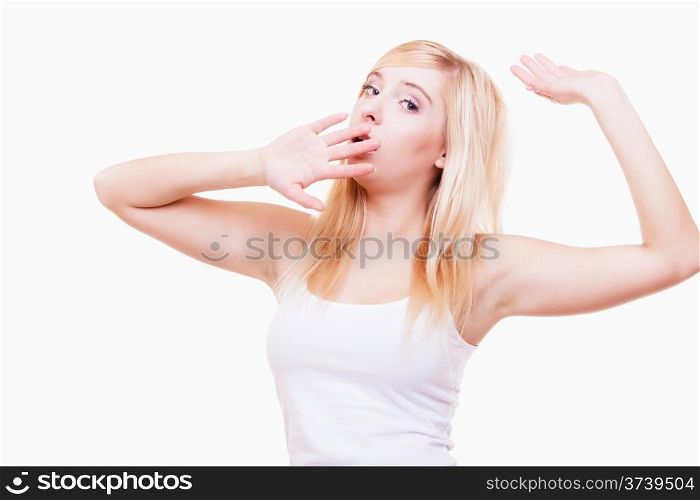 Sleepy tired young woman teen girl yawning and covering her mouth with hand isolated on white background