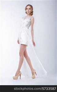 Slender Fashion Model Wearing White Dress