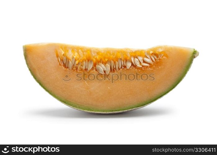 Slice of Cantaloupe melon isolated on white background