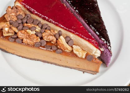 slice of cheesecake with chocolate and nuts. cheesecake with chocolate and nuts