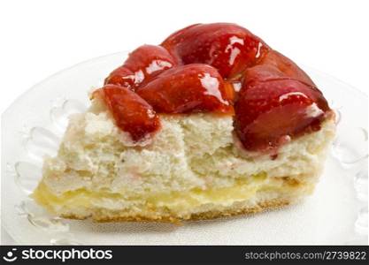 Slice of delicious strawberry cheese cake closeup