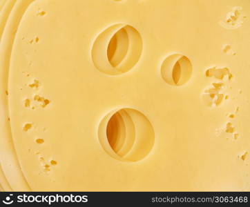 slice of edam cheese, texture, full frame, close up