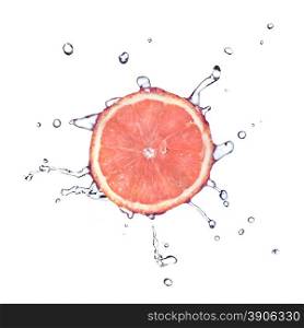 Slice of grapefruit with water drops isolated on white