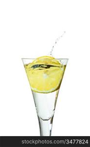 slice of lemon drops in a glass isolated on a white background