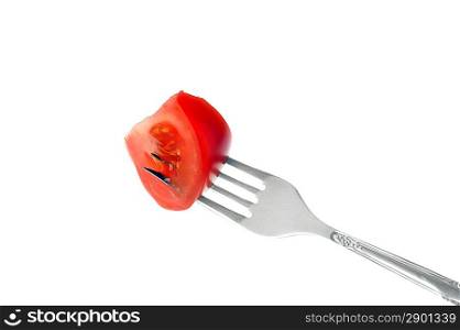 Slice of red tomato on plug