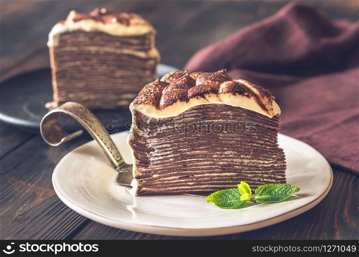Slice of tiramisu crepe cake on the plate