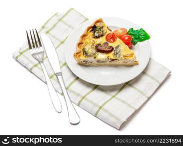 Slice of traditonal homemade spinach chicken quiche tart or pie on plate isolated. Slice of traditonal homemade spinach chicken quiche tart or pie on plate