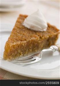 Slice of Treacle Tart with Whipped Cream