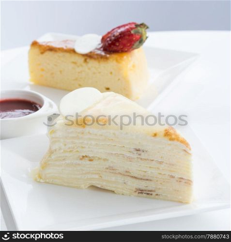 Slice of two delicious cake on dish