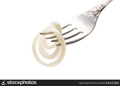 slice onions on a fork isolated on white background