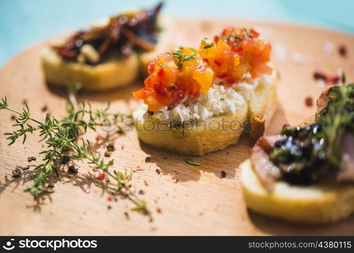 slice toast bread with thymes peppercorn wooden chopping board