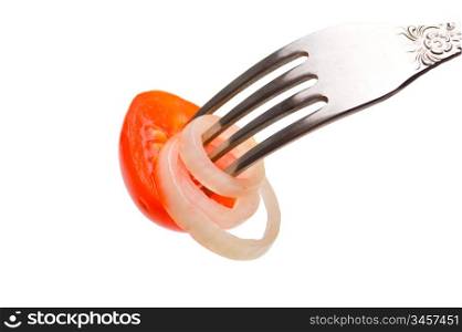 slice tomatoes on a fork isolated on white background