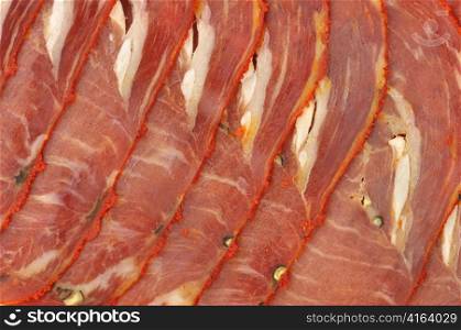 sliced and Smoked beef meat with spices , close up