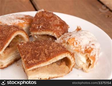 Sliced Apple Pie and Pie with Curds on Plate on Wooden Table