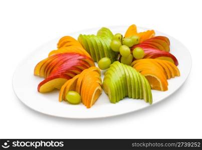 sliced apples and oranges with grapes, shallow DOF, clipping path