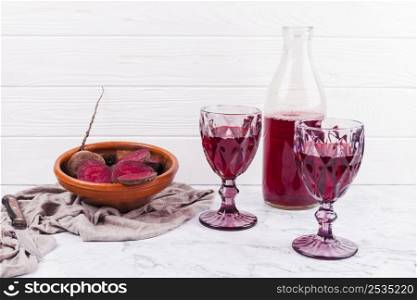 sliced beetroot red juice wineglasses