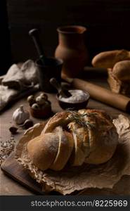 Sliced bread and ingredient on wood table. Homemade bread at wooden tabletop as baking concept