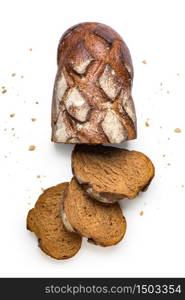 Sliced brown bread and crumbs isolated on a white background