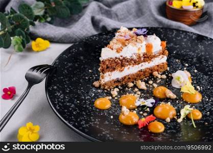 Sliced carrot cake filled and topped with cream cheese