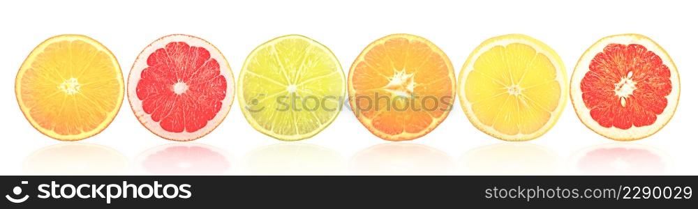 Sliced citrus fruits with light reflection isolated on white background.
