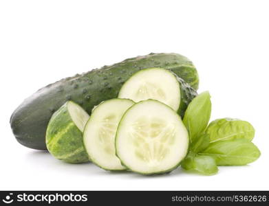 Sliced cucumber vegetable and basil leaves still life isolated on white background cutout