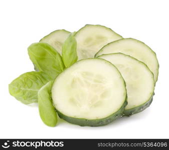 Sliced cucumber vegetable and basil leaves still life isolated on white background cutout